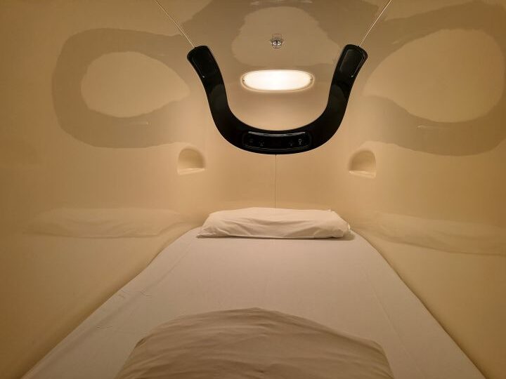 Capsule-style sleeping pods and shower rooms at Nine Hours Narita Airport